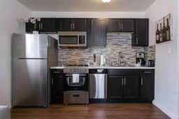 Downtown Apartment with Patio, Parking & Modern Kitchen - Image 3